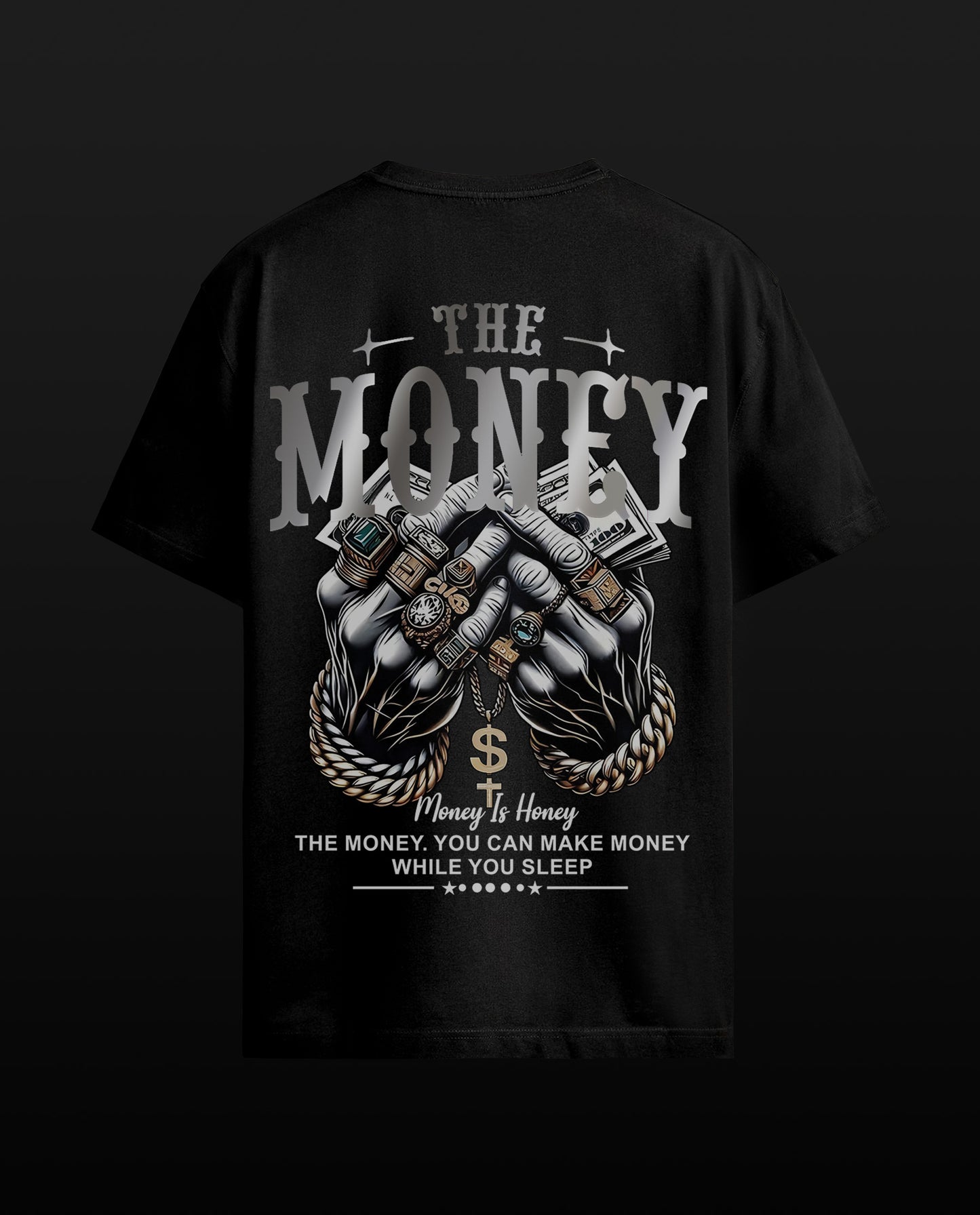 A black short-sleeve t-shirt with a large graphic print on the back, featuring the text 'THE MONEY' and 'Money Is Honey' with a detailed illustration of hands wearing rings and holding cash, set against a dark background.